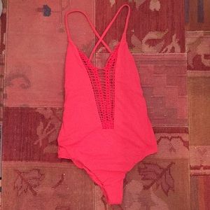 Pink Billabong one-piece swim suit. Size M